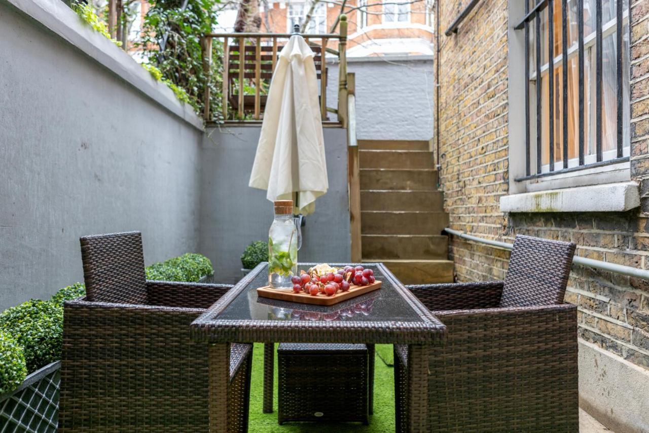 Elegant Kensington Apartment With Patio ロンドン エクステリア 写真